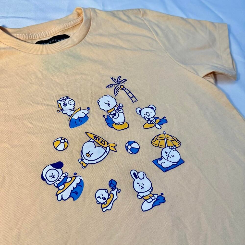 Penshoppe yellow t shirt with blue cartoon prints BTS BT21 tata cooky